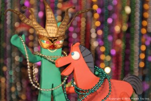 Gumby and Pokey with Mardi Gras beads